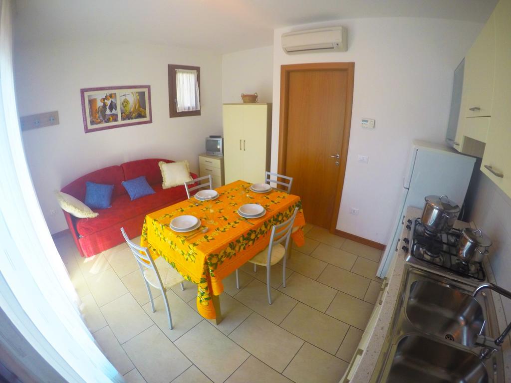 Residence Le Piramidi Каорле Экстерьер фото