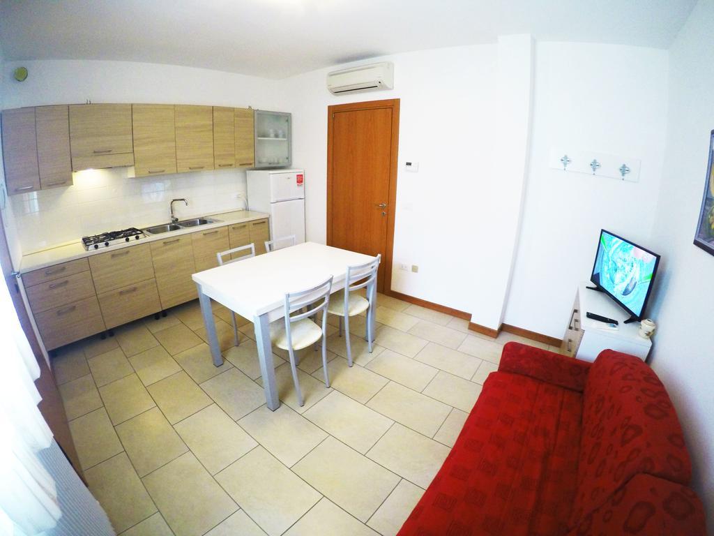 Residence Le Piramidi Каорле Экстерьер фото
